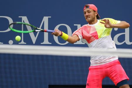 Sep 4, 2016; New York, NY, USA; Lucas Pouille of France hits a forehand against Rafael Nadal of Spain (not pictured) on day seven of the 2016 U.S. Open tennis tournament at USTA Billie Jean King National Tennis Center. Mandatory Credit: Geoff Burke-USA TODAY Sports