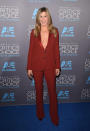 <p>Jennifer Aniston not only wore color, she wore pants on the red carpet! At the People’s Choice Awards, the actress wore Gucci suit, without a shirt on underneath, accessorized with some sexy boob jewelry.</p>