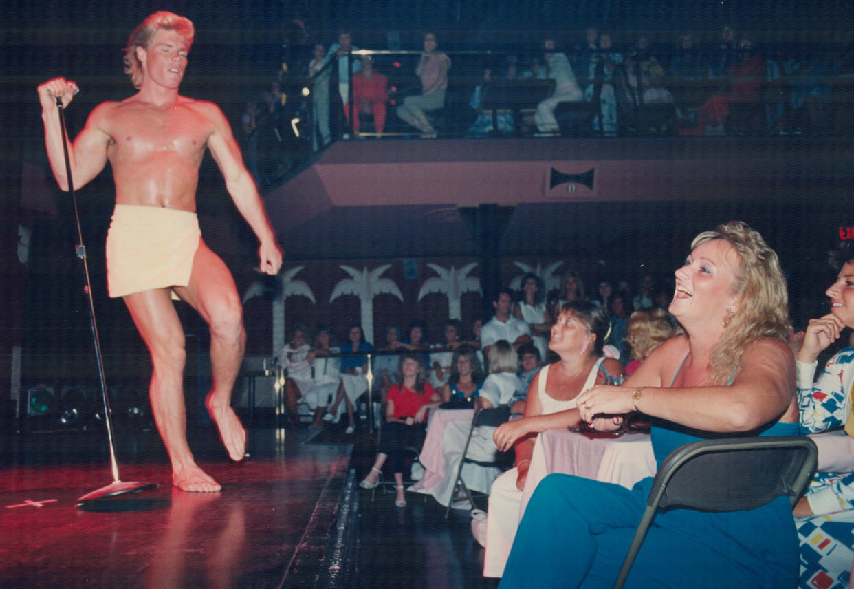 The audience enjoys a vintage Chippendales performance. (Photo: Getty Images)