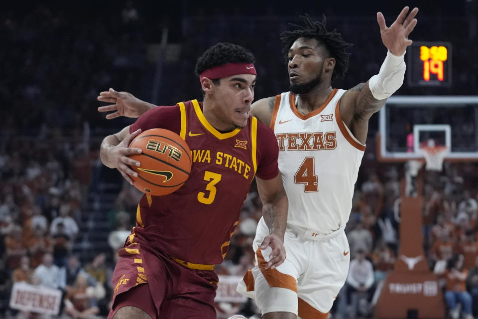 Iowa State guard Tamin Lipsey (3) drives against Texas guard Tyrese Hunter (4) during the first half of an NCAA college basketball game Tuesday, Feb. 6, 2024, in Austin, Texas. (AP Photo/Eric Gay)