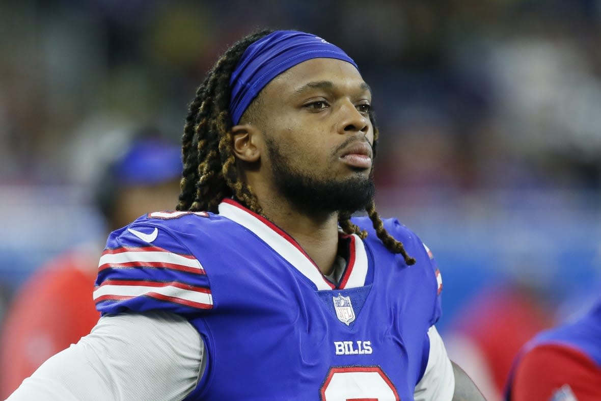 FILE – Buffalo Bills safety Damar Hamlin looks on during the second half of an NFL football game against the Cleveland Browns, Nov. 20, 2022, in Detroit. Hamlin collapsed on the field and appeared to be getting CPR before being driven off the field in an ambulance during an NFL football game against the Cincinnati Bengals, Monday, Jan. 2, 2023. (AP Photo/Duane Burleson, File)