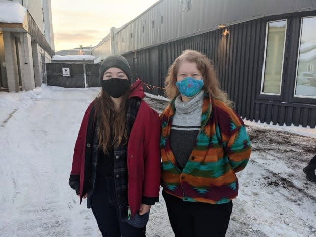 Shari Heal, right, and daughter Brianna were some of the first to get vaccinated at the Whitehorse clinic, which is now open to all adults. Brianna is 19, making her one of the youngest people eligible to use the clinic, which opened to those over 18 as of Monday. (Steve Silva/ CBC - image credit)