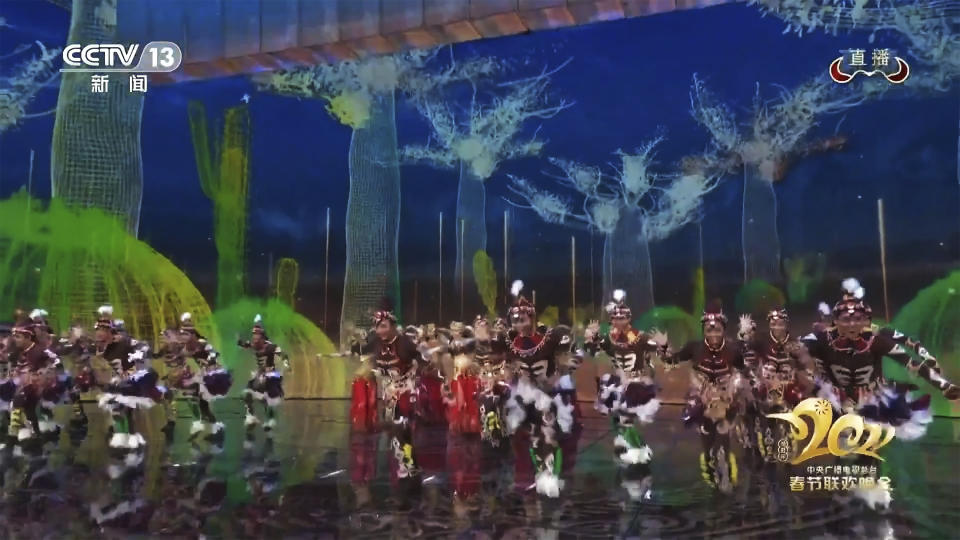 In this image taken from video footage run by China's CCTV via AP Video, dancers in blackface and costumes portraying Africans perform on stage during the Spring Festival Gala, one of the world's most-watched TV programs in Beijing on Friday, Feb. 12, 2021. (CCTV via AP)