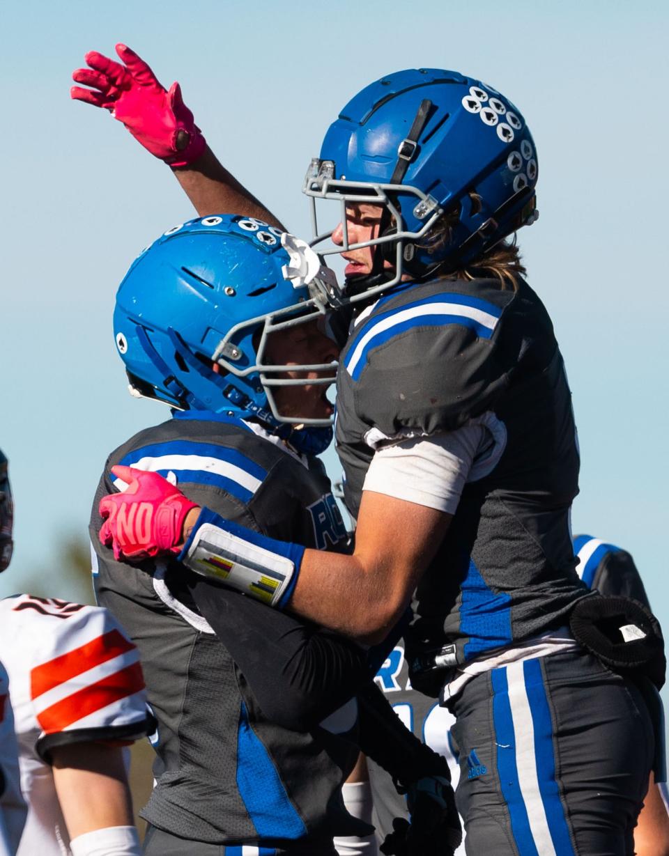 Rich High School’s Jaden Desch, right, and Jack Bell celebrate after Desch’s touchdown during the 1A 8-player football state championship agains Monticello High School at Southern Utah University in Cedar City on Saturday, Nov. 11, 2023. | Megan Nielsen, Deseret News