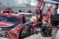 Christopher Bell in the No. 20 car pits during a NASCAR Cup Series auto race, Sunday, Feb. 28, 2021, in Homestead, Fla. (AP Photo/Wilfredo Lee)