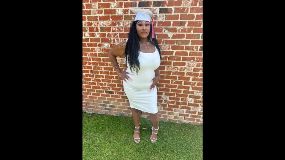 L.B., pictured her in the white dress she wanted to wear to her high school graduation in Mississippi