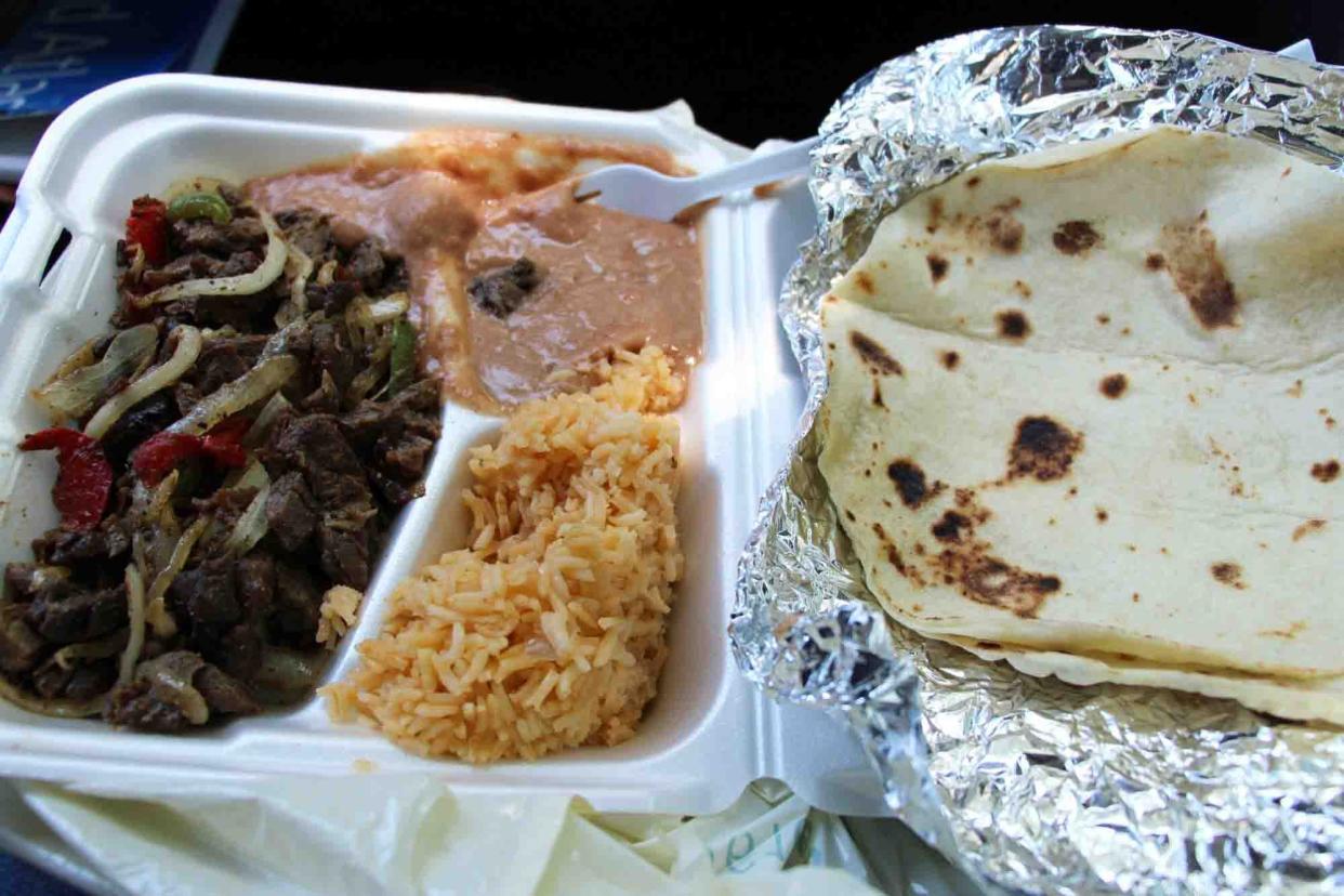 mary's tacos takeout box with tortillas and taco filling