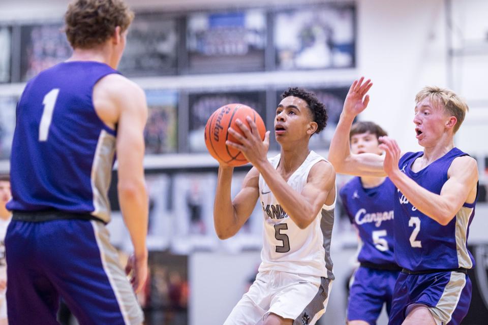 Randall Raiders’s, KJ Thomas (5), prepares for a shot at a home game against the Canyon Eagles on Tuesday, November 17, 2021 at Randall High School in Amarillo, TX.