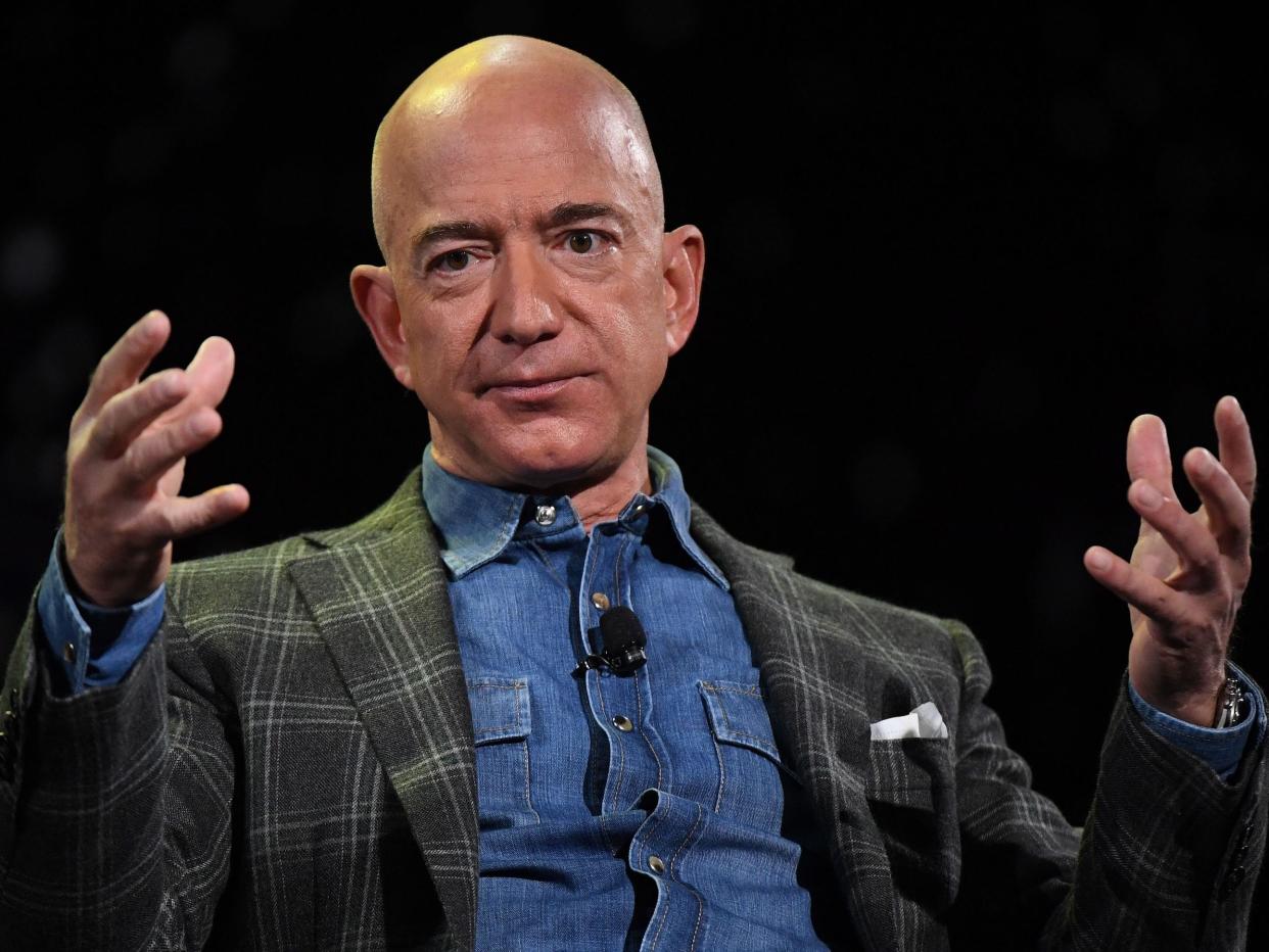 Amazon Founder and CEO Jeff Bezos addresses the audience during a keynote session at the Amazon Re:MARS conference on robotics and artificial intelligence at the Aria Hotel in Las Vegas, Nevada on June 6, 2019.