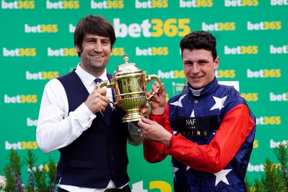South Wales Argus: Trainer Christian Williams and jockey Jack Tudor after winning the bet365 Gold Cup Handicap Chase with Kitty's Light at Sandown