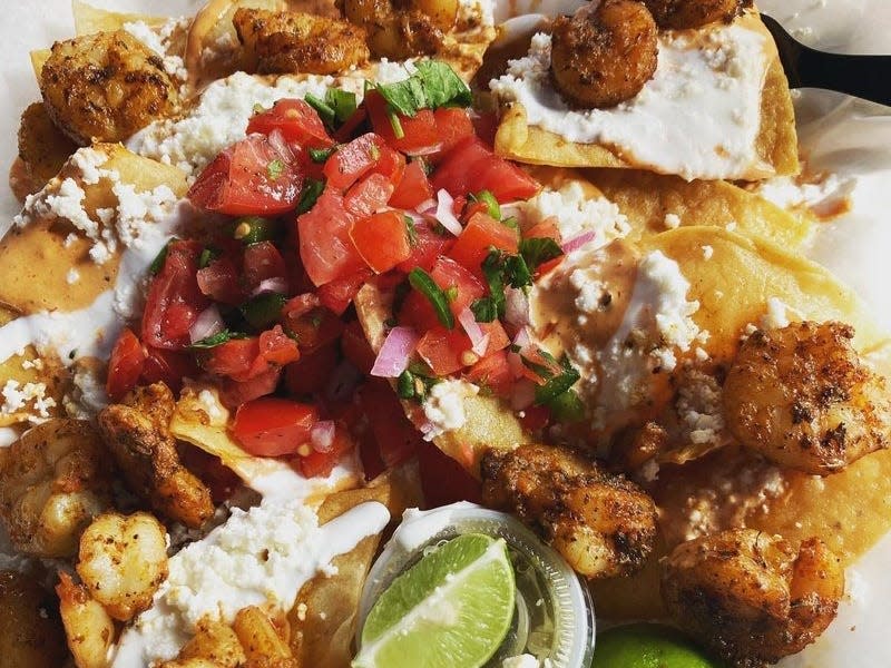 Plate of shrimp nachos.