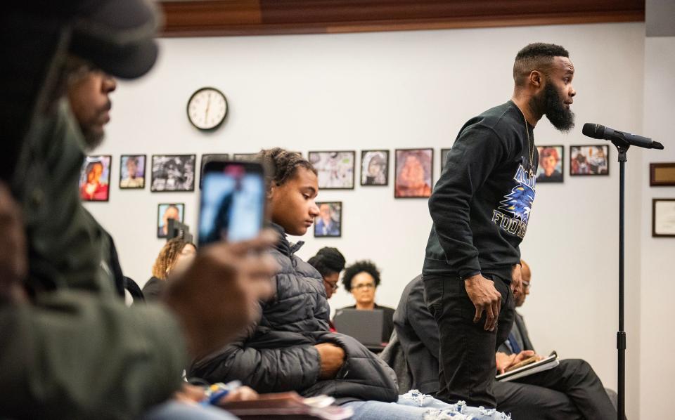 Andrew Watson, Wingfield High School head football coach, speaks against the consolidation of schools during the Jackson Public Schools District board meeting on Tuesday, Dec. 19, 2023.