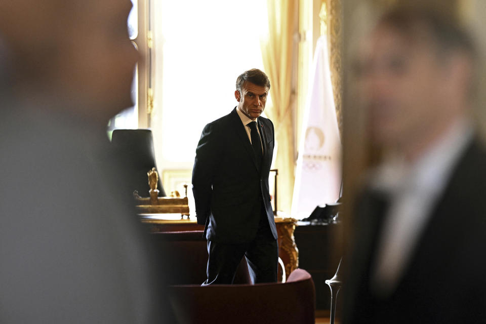 French President Emmanuel Macron waits for a bilateral meeting during the African Vaccine Manufacturing Accelerator conference, Thursday, June 20, 2024 in Paris. French President Emmanuel Macron is joining some African leaders to kick off a planned $1 billion project to accelerate the rollout of vaccines in Africa, after the coronavirus pandemic bared gaping inequalities in access to them. (Dylan Martinez/Pool via AP)