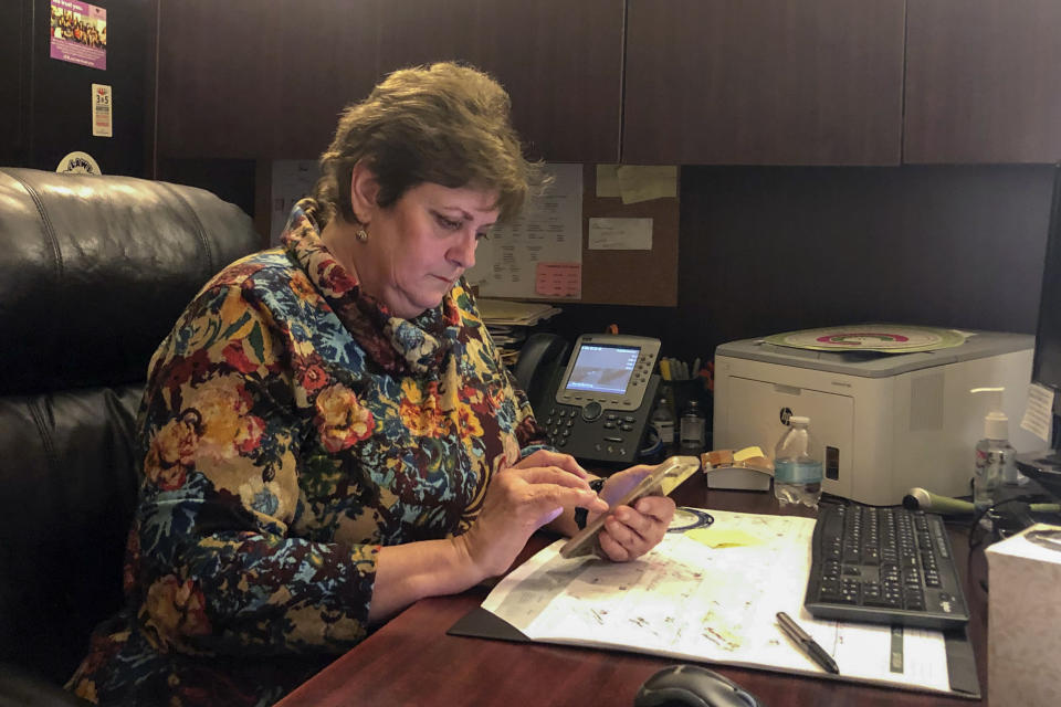 Kathaleen Pittman, the administrator of the Hope Medical Group for Women in Shreveport, La., works in her office on Feb. 20, 2020. The clinic is one of three in the state that provides abortions to women, and it is challenging a state law that requires doctors who perform abortions to have admitting privileges at a nearby hospital. The Supreme Court is hearing the case on March 4. (AP Photo/Rebecca Santana)