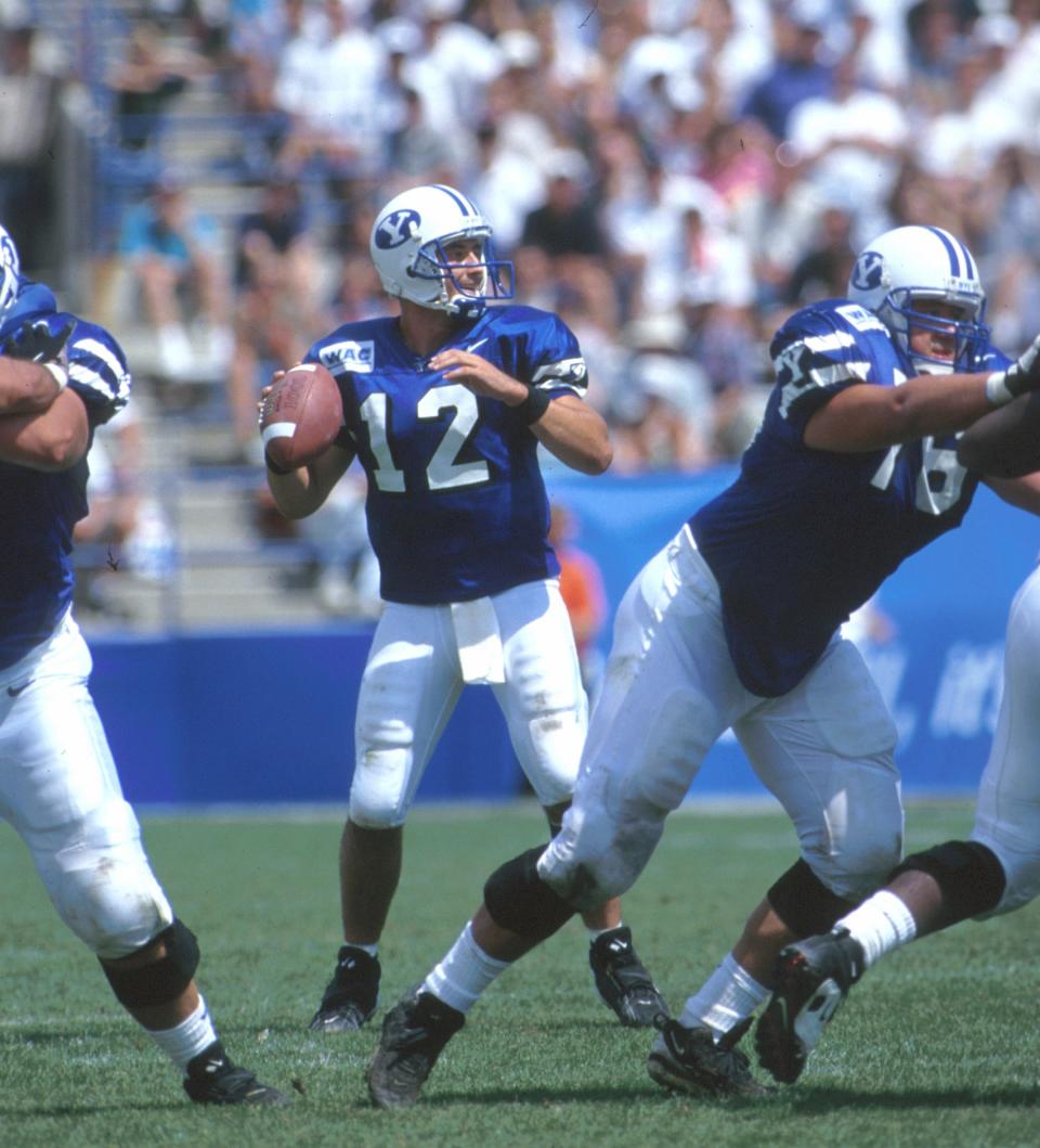 BYU's Steve Sarkisian opened the 1996 season with 536 yards and six touchdowns in a win over Texas A&M and ended it with a pair of fourth-quarter touchdowns to lead the Cougars past Kansas State in the Cotton Bowl.