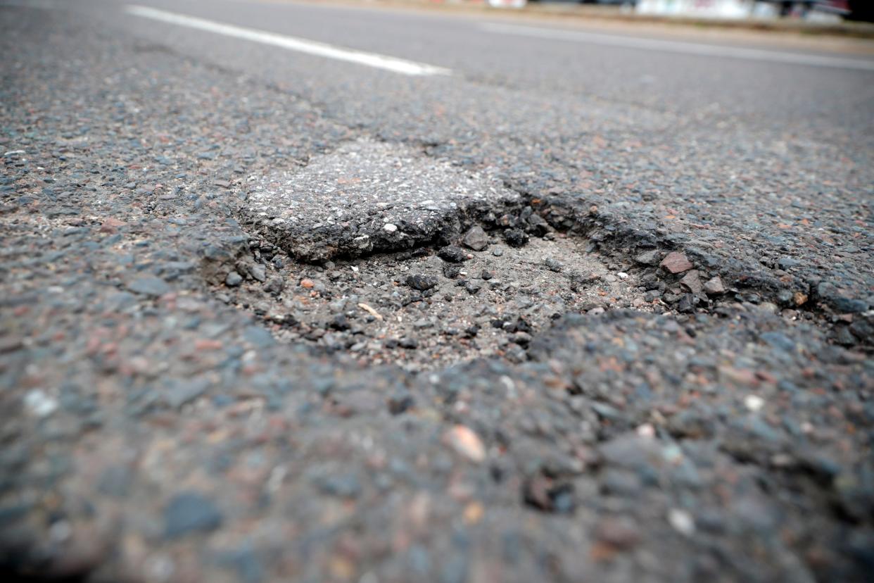A pothole. The City of Piedmont has canceled plans that would have invited residents to help patch their own "pesky" potholes this Saturday with a little training and free materials.