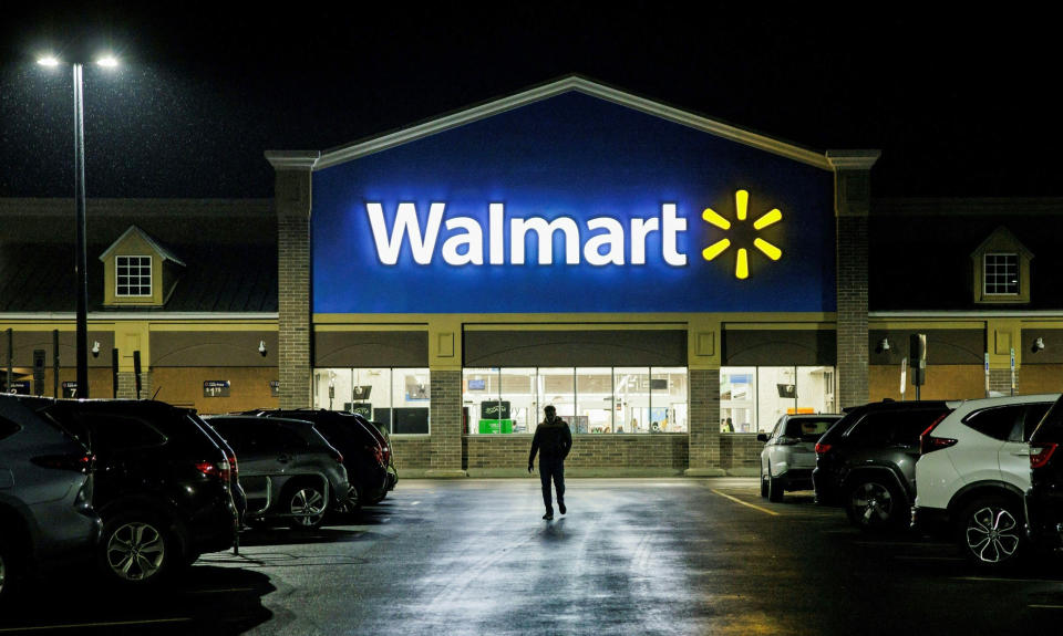 A shopper leaves a Walmart in Wilmington, Del.  (Samuel Corum / AFP - Getty Images)