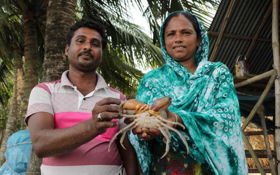 Nilufa Begum and her husband. At the start of the Covid-19 outbreak China banned crab imports. As demand crashed, the price of crabs in the domestic market fell by two-thirds - Susannah Savage