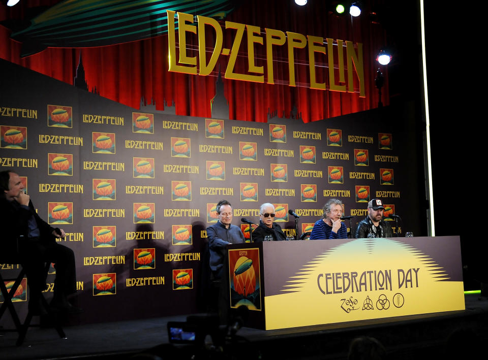 Led Zeppelin, from left, bassist/keyboardist John Paul Jones, guitarist Jimmy Page, singer Robert Plant, and drummer Jason Bonham participate in a press conference ahead of the worldwide theatrical release of "Celebration Day", a concert film of their 2007 London O2 arena reunion show, at the Museum of Modern Art on Tuesday, Oct. 9, 2012 in New York. (Photo by Evan Agostini/Invision/AP)