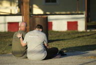 <p>A couple comfort each other at a community center in Sutherland Springs, Texas, near the scene of a mass shooting at the First Baptist Church, Nov. 5, 2017. (Jay Janner/Austin American-Statesman via AP) </p>