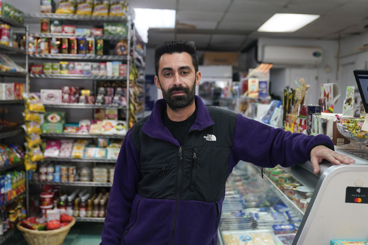 Gleb Gavrilov, owner of Moscow on the Hudson, poses for a picture at his store in New York, Wednesday, March 16, 2022. (AP Photo/Seth Wenig)