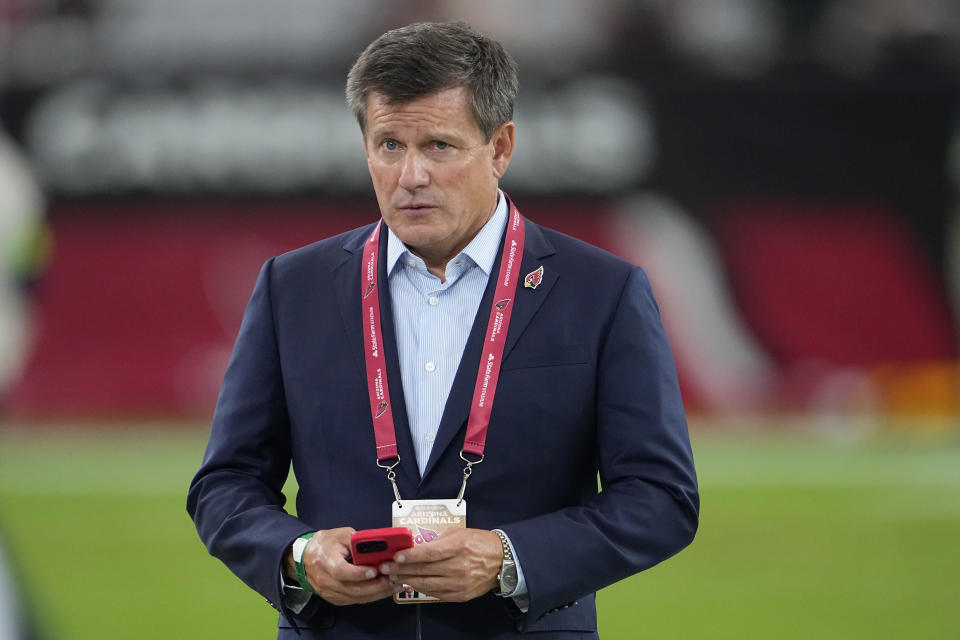 Arizona Cardinals owner Michael J. Bidwill watches players warm up before an NFL preseason football game between the Cardinals and the Denver Broncos in Glendale, Ariz., Friday, Aug. 11, 2023. (AP Photo/Matt York)