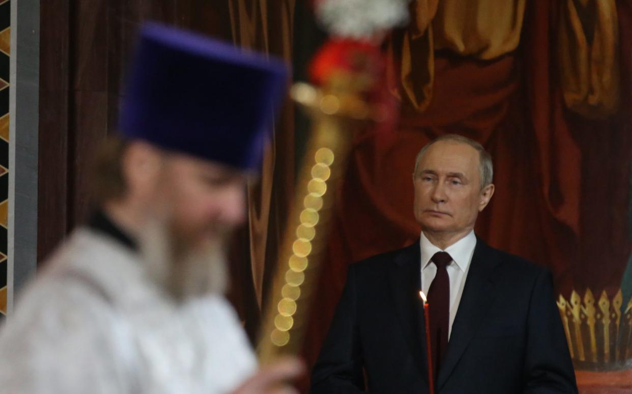 The Russian president makes a public show of his support for the church - Getty