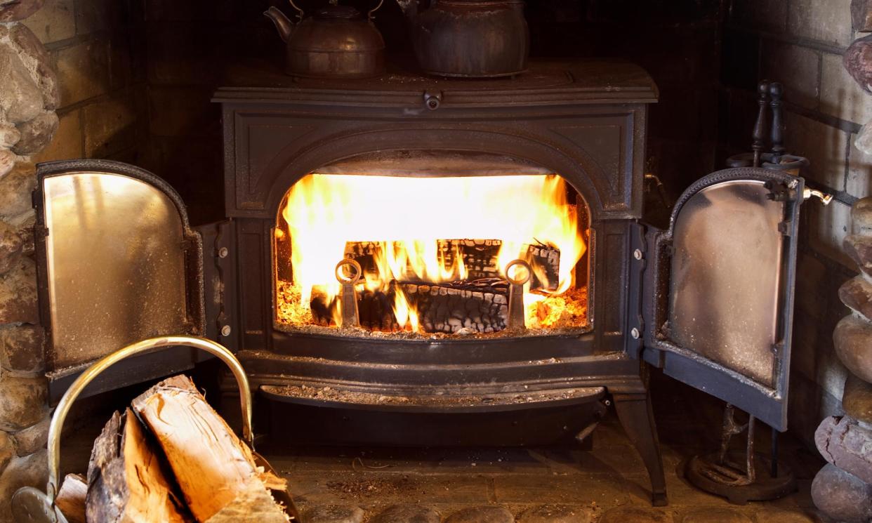<span>The proportion of rural homes that burn wood and coal is twice that in cities.</span><span>Photograph: Rolf Bruderer/Getty Images/Blend Images</span>