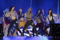 Kpop group "Girls Generation" performs for the crowd during the "Dream Kpop Fantasy Concert" held at the Mall of Asia grounds in Pasay city, south of Manila on 19 January 2013.