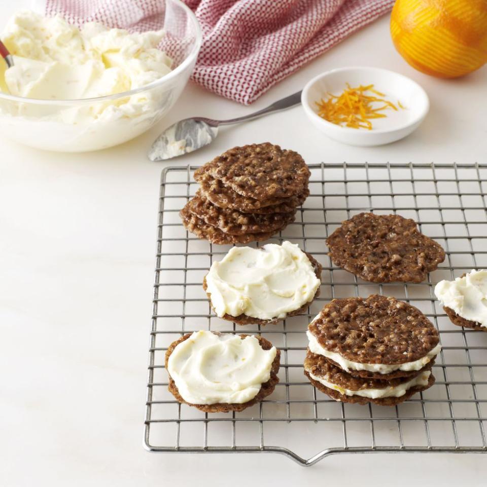 <p>Crunchy, buttery pecan cookies paired with a creamy, citrus-flecked filling makes a heavenly dessert.</p><p><em><a href="https://www.goodhousekeeping.com/food-recipes/a14588/pecan-lace-cookie-sandwiches-recipe-wdy1213/" rel="nofollow noopener" target="_blank" data-ylk="slk:Get the recipe for Pecan Lace Cookie Sandwiches »;elm:context_link;itc:0;sec:content-canvas" class="link ">Get the recipe for Pecan Lace Cookie Sandwiches »</a></em></p>