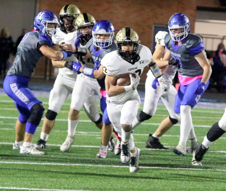 Corning's James Freeman picks up a big gain during a 20-7 win over Horseheads in football Oct. 21, 2022 at Horseheads High School.