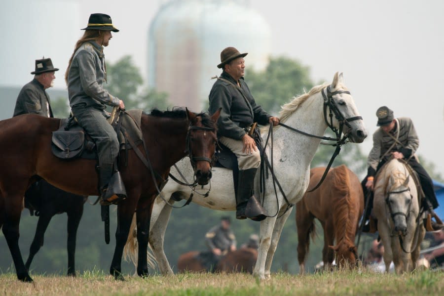 Reenactors do a demonstration on horseback during the 160th reenactment of the Battle of Gettysburg, at Daniel Lady Farm in Gettysburg, Pennsylvania, on June 30, 2023. The Battle of Gettysburg, which is considered to be the bloodiest battle ever fought on US soil, occurred from July 1-July 3, 1863 during the US Civil War. Approximately 10,000 Union and Confederate troops were left dead, and another 30,000 wounded. Each year, the Gettysburg Battlefield Preservation Association holds a reenactment on the weekend closest to the original battle, hosting living history demonstrations and military reenactments to help teach people the history of the Civil War battle. (Photo by Stefani Reynolds / AFP) (Photo by STEFANI REYNOLDS/AFP via Getty Images)