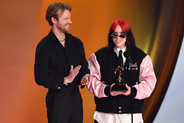 <p>VALERIE MACON/AFP via Getty Images</p> Billie Eilish and Finneas O'Connell accept the Song Of The Year award for "What Was I Made For?" on stage during the 66th Annual Grammy Awards at the Crypto.com Arena in Los Angeles on February 4, 2024