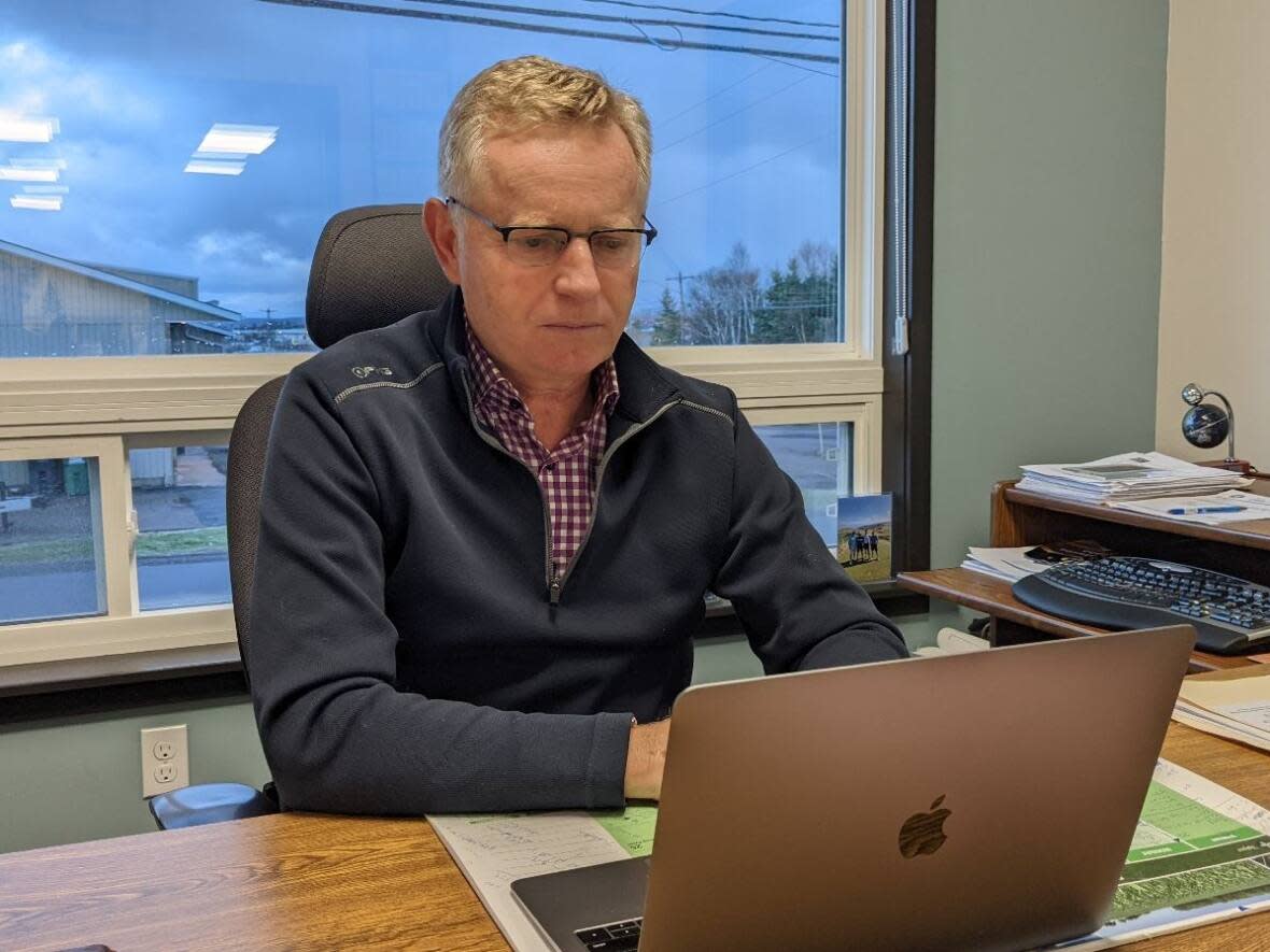 At Red Isle Produce in Charlottetown, Bill Enserink has a staff of eight who would usually be spending their days filling orders, with more than 90 per cent of the potatoes they sell heading to the United States market.   (Shane Hennessey/CBC - image credit)