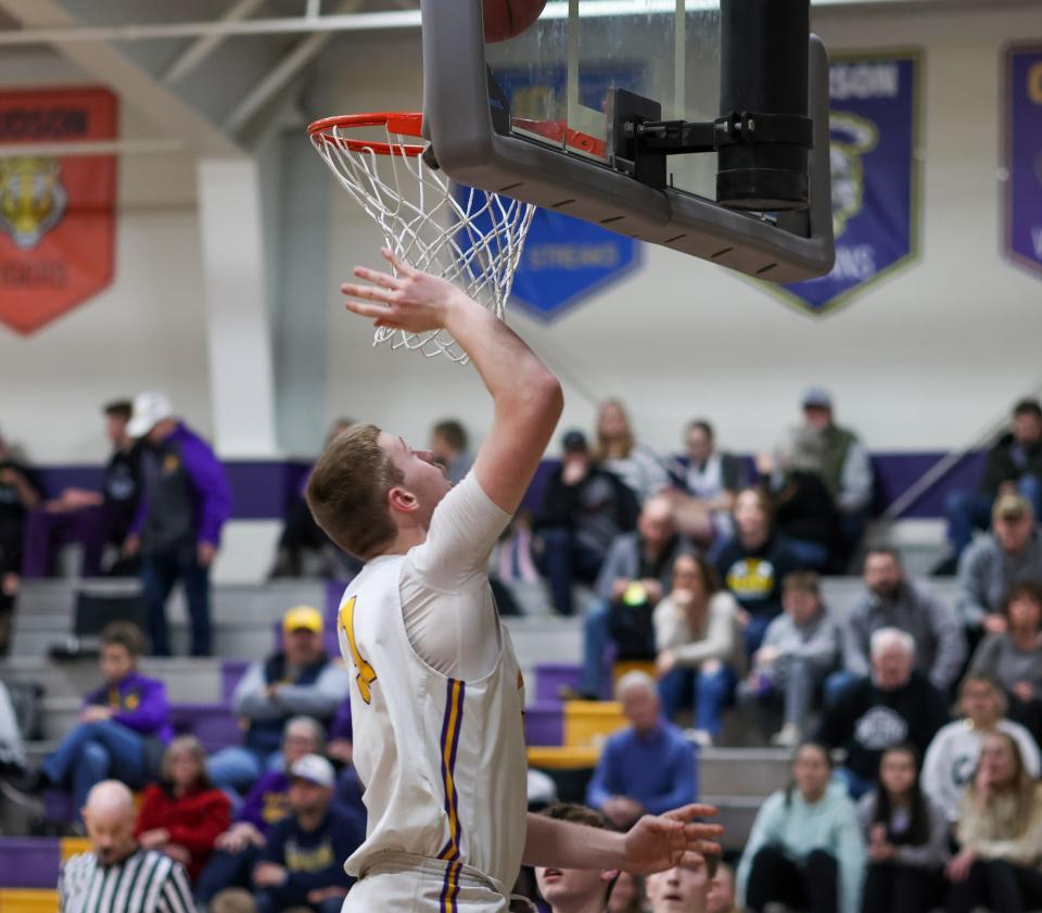 Onsted's Ayden Davis goes up for a layup during Monday's game at home against Blissfield.