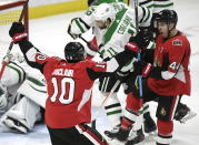 Ottawa Senators centre Jean-Gabriel Pageau (44) celebrates a goal against the Dallas Stars with left wing Anthony Duclair (10) during the first period of an NHL hockey game Sunday, Feb. 16, 2020, in Ottawa, Ontario. (Justin Tang/The Canadian Press via AP)