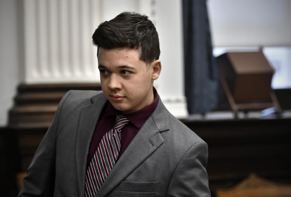 Ky'e Rittenhouse makes his way into the courtroom for his trial at the Kenosha County Courthouse in Kenosha, Wis., on Thursday, Nov. 4, 2021. Rittenhouse is accused of killing two people and wounding a third during a protest over police brutality in Kenosha, last year. (Sean Krajacic/The Kenosha News via AP, Pool)