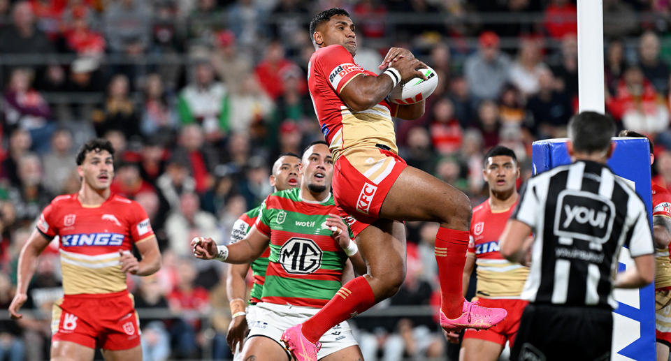 Seen here, Tevita Pangai Junior climbs highest for the Dolphins to catch a high kick against the Rabbitohs. 