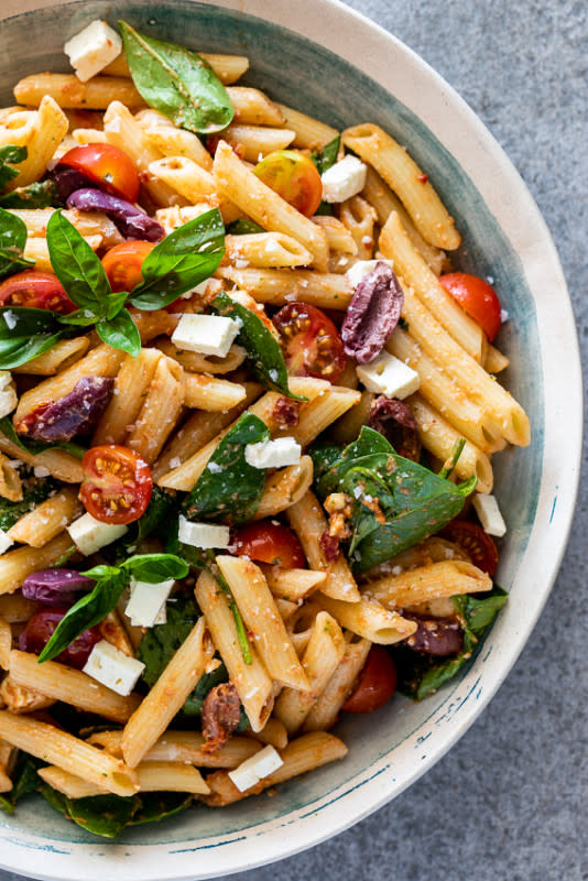 <p>Simply Delicious Food</p><p>This sun-dried tomato pesto pasta salad is a delicious, easy summer side dish or simple, vegetarian lunch or dinner plus it can be made ahead!</p><p><strong>Get the recipe: <a href="https://simply-delicious-food.com/sun-dried-tomato-pesto-pasta-salad/" rel="nofollow noopener" target="_blank" data-ylk="slk:Sun Dried Tomato Pesto Pasta Salad;elm:context_link;itc:0;sec:content-canvas" class="link rapid-noclick-resp"><em>Sun Dried Tomato Pesto Pasta Salad</em></a></strong></p>