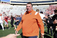 Illinois head coach Bret Bielema walks off the field following a 34-10 win over Wisconsin in an NCAA college football game Saturday, Oct. 1, 2022, in Madison, Wis. (AP Photo/Kayla Wolf)