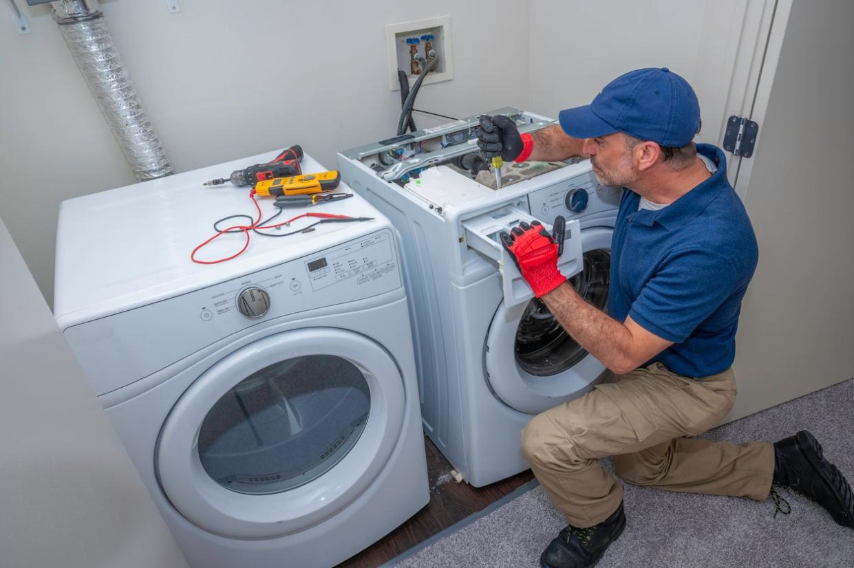 who to call to fix washing machine