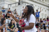 Rep. Cori Bush, D-Mo., speaks to crowds that attended a sit-in at Capitol Hill after it was announced that the Biden administration will enact a targeted nationwide eviction moratorium outside of Capitol Hill in Washington on Tuesday, August 3, 2021. For the past five days, lawmakers and activists primarily led by Rep. Cori Bush, D-Mo., have been sitting in on the steps of Capitol Hill to protest the expiration of the eviction moratorium. (AP Photo/Amanda Andrade-Rhoades)