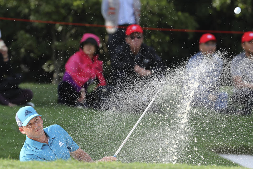 Sergio Garcia of Spain hits the ball from a bunker during the HSBC Champions golf tournament held at the Sheshan International Golf Club in Shanghai on Friday, Nov. 1, 2019. (AP Photo/Ng Han Guan)