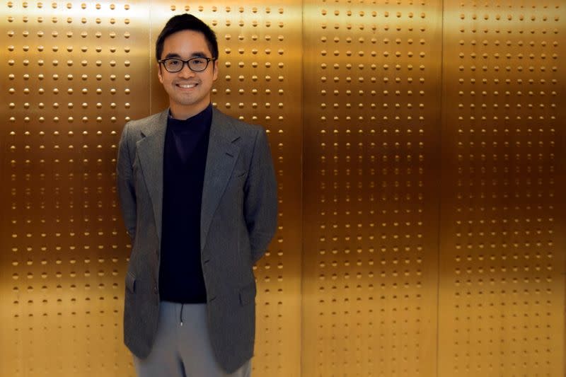 FILE PHOTO: Hong Kong billionaire Cheng, the grandson of Hong Kong tycoon Cheng Yu-teng, poses for a photograph in Hong Kong