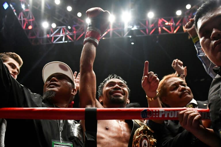 Manny Pacquiao (C) silenced all his critics with a seven-round destruction of champion Lucas Matthysse Sunday