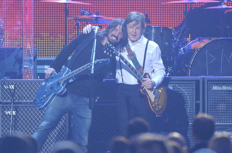 Music legend Paul McCartney (R, with Dave Grohl) as well as major music labels and film studios have lobbied politicians urging them to back the copyright changes