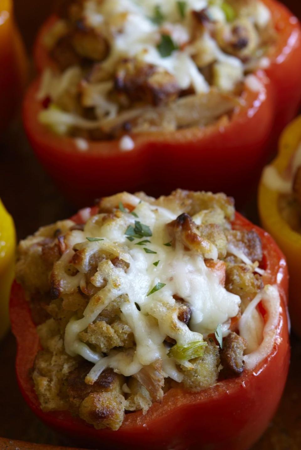 <p>Get creative and use that leftover turkey and stuffing to make these colorful stuffed bell peppers. </p><p><strong>Get the recipe at <a href="https://www.delish.com/holiday-recipes/thanksgiving/recipes/a44319/leftover-turkey-and-stuffing-stuffed-peppers/" rel="nofollow noopener" target="_blank" data-ylk="slk:Delish.;elm:context_link;itc:0;sec:content-canvas" class="link ">Delish. </a></strong></p>