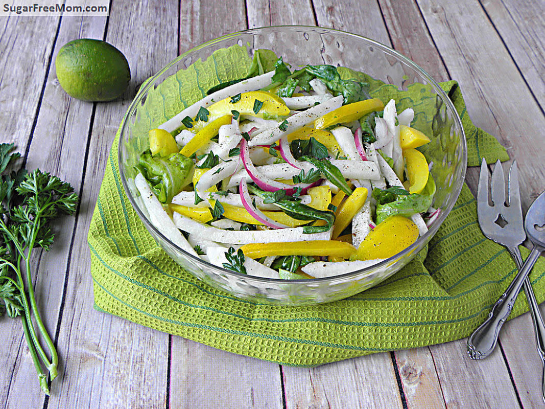 <p>Sugar Free Mom</p><p>A refreshing and easy summer side dish with a fabulous lime vinaigrette dressing!</p><p><a href="http://www.sugarfreemom.com/recipes/jicama-arugula-herb-salad-with-lime-vinaigrette/" rel="nofollow noopener" target="_blank" data-ylk="slk:Get the recipe!;elm:context_link;itc:0;sec:content-canvas" class="link rapid-noclick-resp">Get the recipe!</a></p>