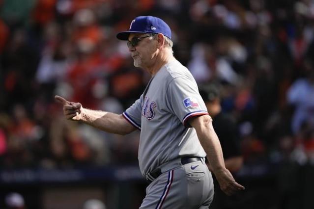 Texas Rangers relief pitcher Dane Dunning prepares to pitch during