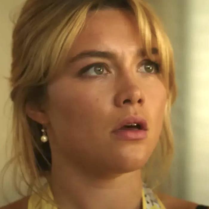 Close-up of Florence Pugh in "Don't Worry Darling" looking shocked